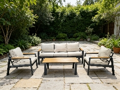 Ensemble de mobilier de jardin en aluminium anthracite avec coussins beige pour 5 personnes, idéal pour terrasse ou jardin, allie élégance et confort.