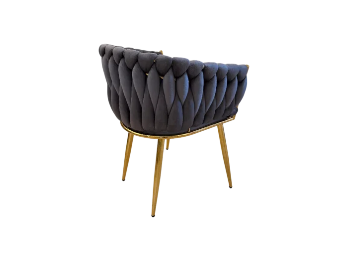 Fauteuil en velours gris avec design capitonné, pieds en métal doré, parfait pour un salon élégant et moderne.